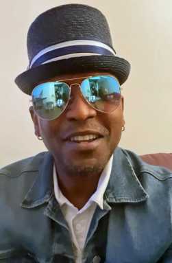 Trinidadian calypsonian Keet Styla, aka Designer.
