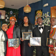 Owner of Bleu Fin Bar & Grill, Hollis Barclay, left, with honorees, Petula Hanley, Democracy Beyond Elections Coalition, manager at the Participatory Budgeting Project, Oma Halloway, chief operations officer of Bridge Street Development Corporation, Reverend Dr. David K. Allen, founder of Epic Village Community Development Corp, and Reverend Dr. Clive E. Neil, pastor of Bedford Central Presbyterian Church, after being honored at the 633 Nostrand Ave., Brooklyn location, Feb. 25.
