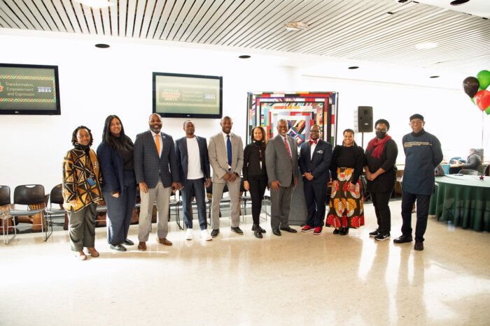 BMCC's AHM planning committee with BMCC President Dr. Anthony E Munroe (seventh from left) and Craig Wesley, senior manager of Diversity Equity and Inclusion (eighth from left) at the Simons Foundation.