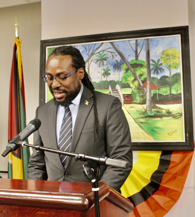 Communications Officer of the Jamaica Consulate, Charistopher Benjamin delivering a message on behalf of the Consular Corps, during a 54th Republic Day Observance at the Guyana Consulate in Manhattan, on Feb. 22.