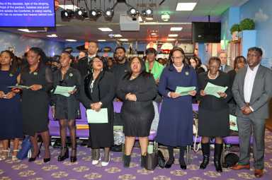 Family members of the late Alleyne DeRoche at the front pew.