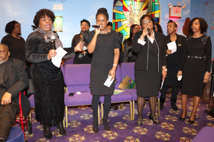 Bethany Deliverance Church of God Choir pays tribute in song.