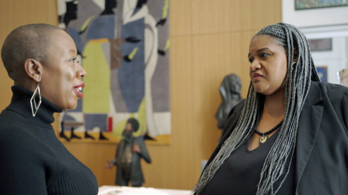 Jeffreen Hayes in conversation with Tammi Lawson, curator of art and artifacts at the Schomburg Center. Photo by Jane