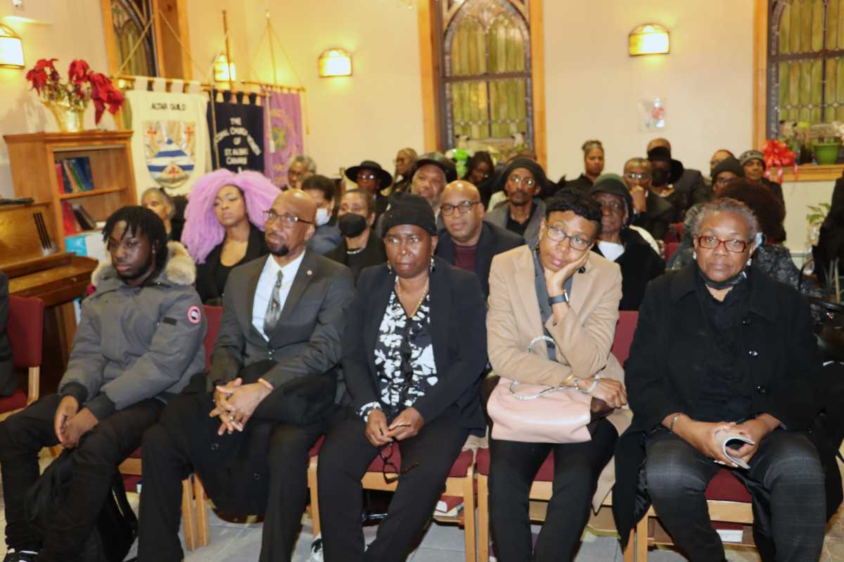 Some of the mourners at the funeral of Joseph Alexander Hinds.