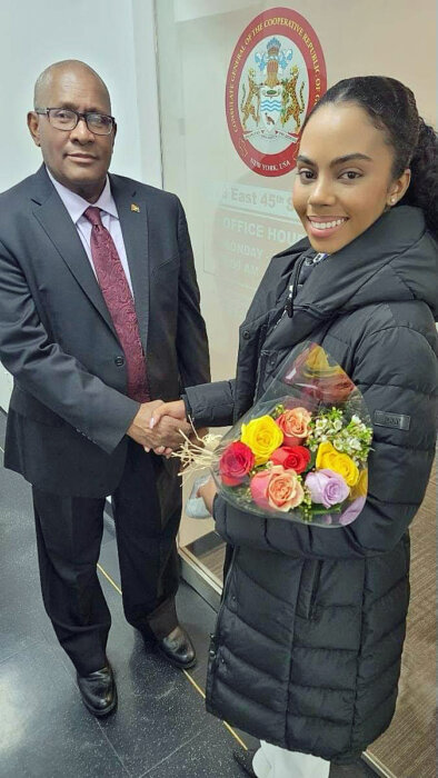 Consul General of Guyana to New York, Ambassador Michael E. Brotherson, left, wishes Miss Guyana World 2022/23, Andrea King well as she journeys to capture the title in India.