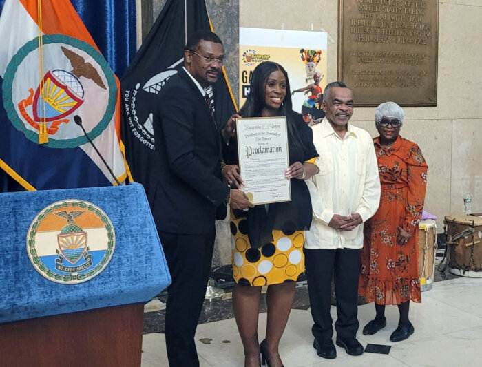 SVG Consul General to the United States Rondy McIntosh receives proclamation from Bronx Borough President Vanessa Gibson, second from left, flanked by Jose Avila and the Mistress of Ceremonies.
