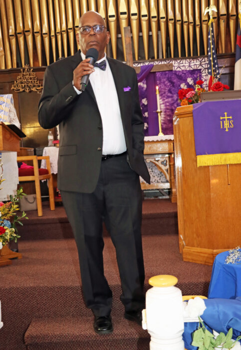 Rev. Roger Jackson, pastor of Fenimore Street United Methodist Church, addresses the congregation.