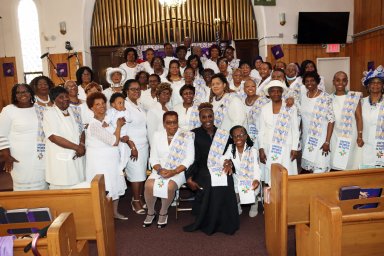 United Women of Faith with Rev. Wendy Paul Paige, front and center, and Pastor Roger Jackson at back.
