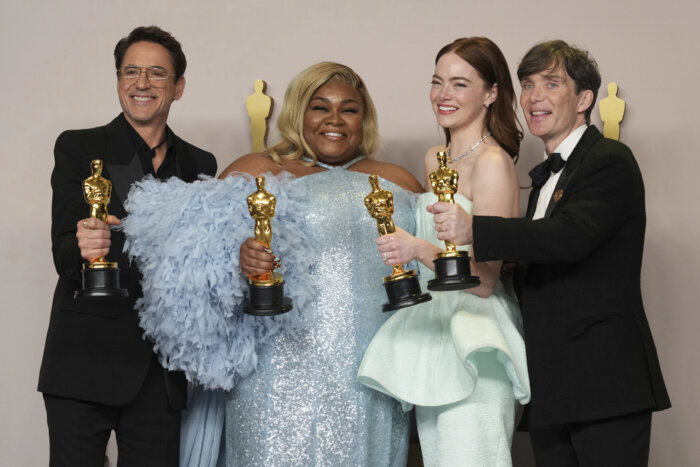 Robert Downey Jr., winner of the award for best performance by an actor in a supporting role for "Oppenheimer," from left, Da'Vine Joy Randolph, winner of the award for best performance by an actress in a supporting role for "The Holdovers," Emma Stone, winner of the award for best performance by an actress in a leading role for "Poor Things," and Cillian Murphy, winner of the award for best performance by an actor in a leading role for "Oppenheimer," pose in the press room at the Oscars on Sunday, March 10, 2024, at the Dolby Theatre in Los Angeles.