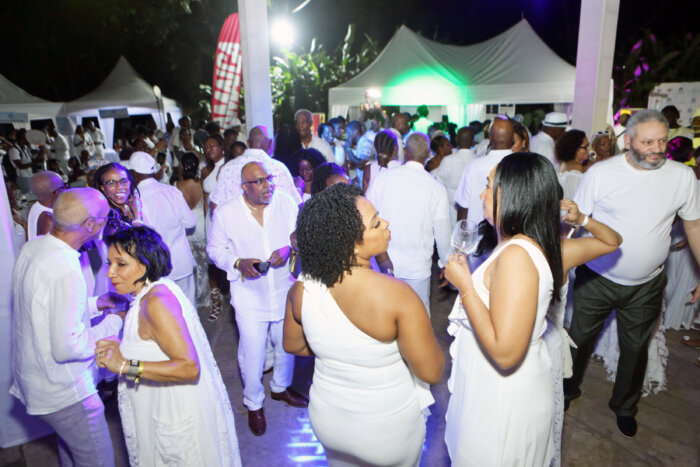 Patrons dancing at the Elite Weekend, All White party at Devon House, Jamaica.