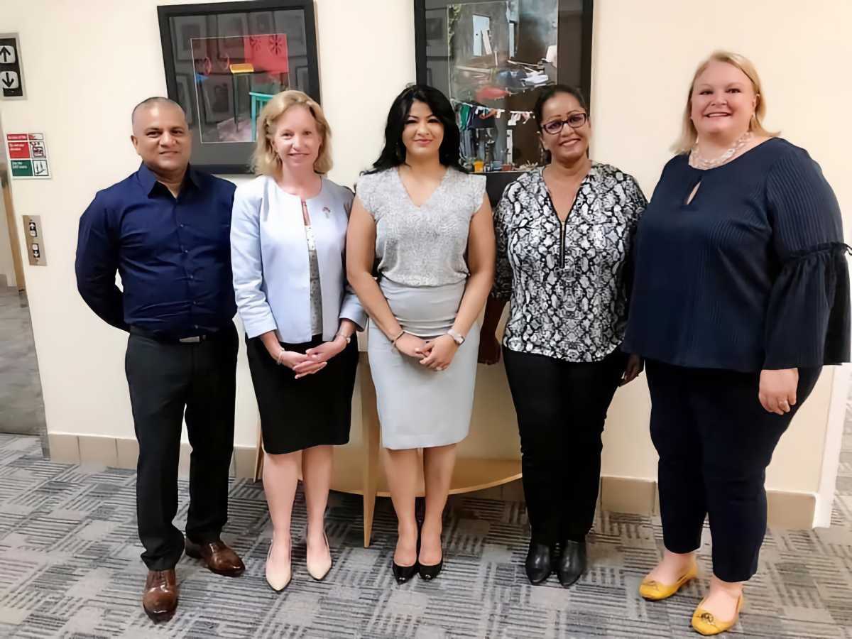 SHEA Charity Founder Lori Narine (middle), along with volunteers and United States Embassy officials in Georgetown, Guyana.