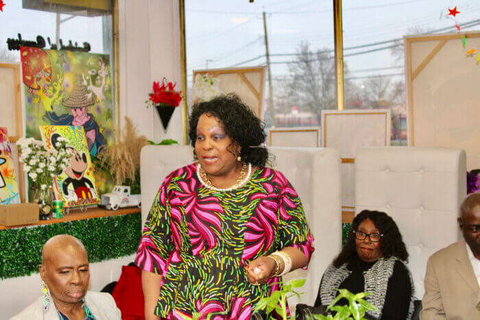 Executive Legislative Aid, Sen. Britnee N. Timberlake, 34th New Jersey District, Lady Ira Lewis addressing the gathering of women during a March 27, Conversations with Phenomenal Woman presentation at Queens Twisted N' Brushes, as the 2024 Int. Women's History Month celebration comes to a close.