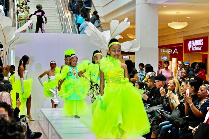 Cute little models jazzed up the catwalk wearing neon green creations by designer Tashii.