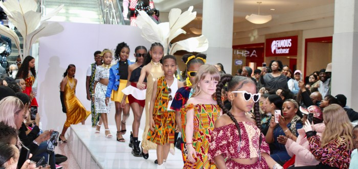 Qumora, created by former KP runway model, are showcased by adorable little children at last Saturday, Kings Plaza mall event to begin Brooklyn Fashion Week.