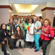 Big smiles, and the wave of Guyana's Golden Arrowhead flag, for President of Guyana, Irfaan Ali at Kings County Hospital Center, during his very first walkabout in Brooklyn on April 19.