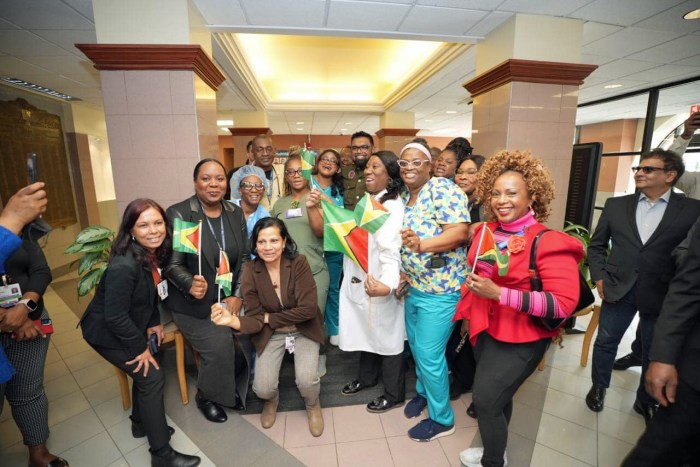 Big smiles, and the wave of Guyana's Golden Arrowhead flag, for President of Guyana, Irfaan Ali at Kings County Hospital Center, during his very first walkabout in Brooklyn on April 19.