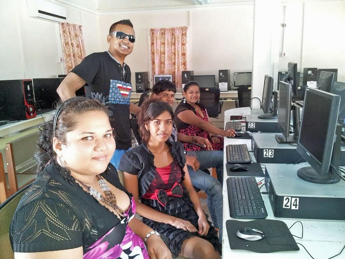 Terry Gajraj with beneficiaries of the Save Abee Foundation computer class.
