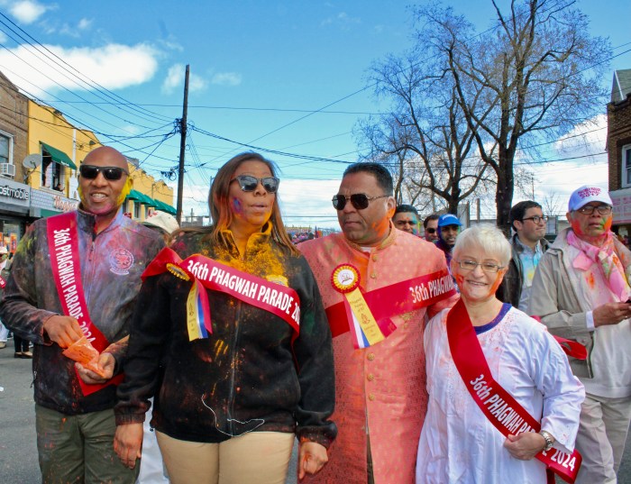 From left, Queens Borough President Donovan Richards Jr., NY Attorney General Letitia James, Phagwah Committee member, Romeo Hitlall, Lynn Schulman, and extreme right, Dr. Dhanpaul Narine, walked in the 36th Annual Phagwah parade last Sunday to celebrate the arrival of spring.