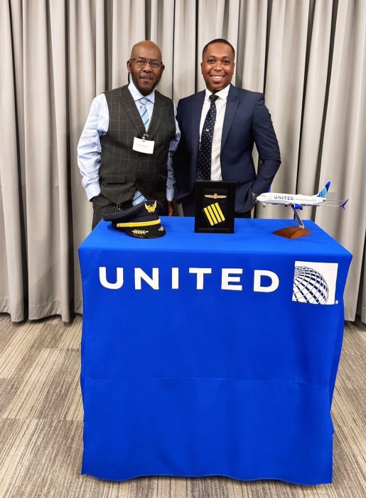 Anthony and his dad, Oswald Greene, at his ceremony day.