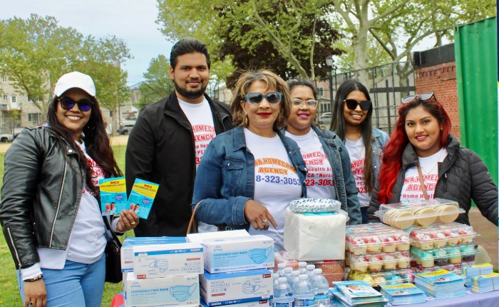 Owner of Bena's Homecare, Bena, third from left, with staff at the 2nd Annual Annual Autism and Developmental Disabilities Walk to bring awareness at the Scooter Rizzuto Park/Smokey Oval, in Richmond Hill, Queens, last Saturday.