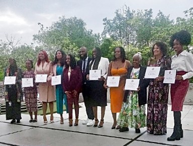 Honorees standing with Congresswoman Yvette D. Clarke (fifth from left) and Assembly member Brian Cunningham (sixth from left).