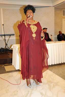 Evangelist Bridget Blucher rocks house.