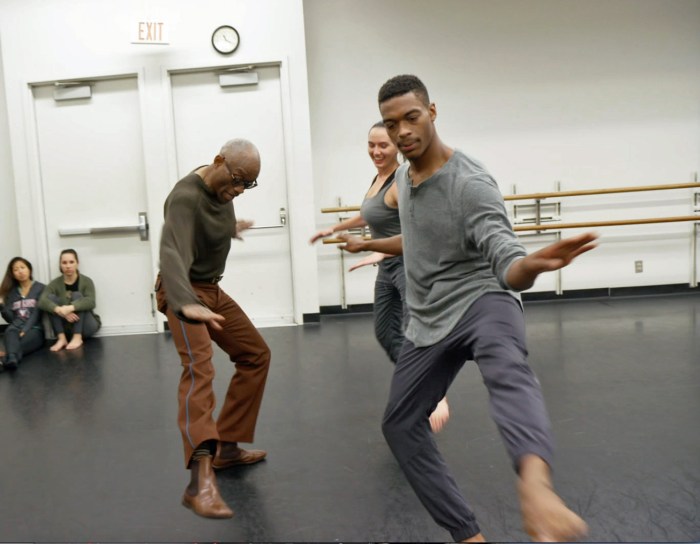 Bill T. Jones in rehearsal doing Astaire steps with students Brandon and Nicole.