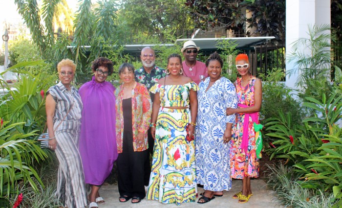 Caribbean-American travellers strike a pose in the garden of boutique hotel "La Distancia" in Havana, Cuba, during a five-day tour of the island nation. From left Lisa Marie, Rita, Sandra, (back row) Luis McSween, president of Caribeat; (front) Monique McSween, Caribeat; Nadine, and (back row) Loughton, and Tangerine Clarke.