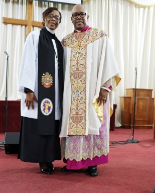 Pastor the Rev. Dr. Roxie Morris and Bishop Dr. David N. McDonald offer final pose to congregants.
