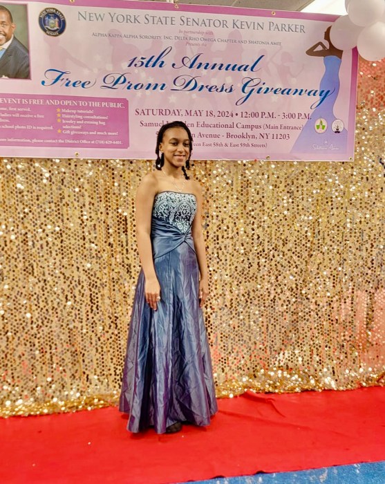 A young lady is photographed after selecting a prom gown at Sen. Kevin Parker's 15th Annual Prom Dress giveaway, at Samuel J. Tilden Educational Campus, Tilden Avenue on May 18.
