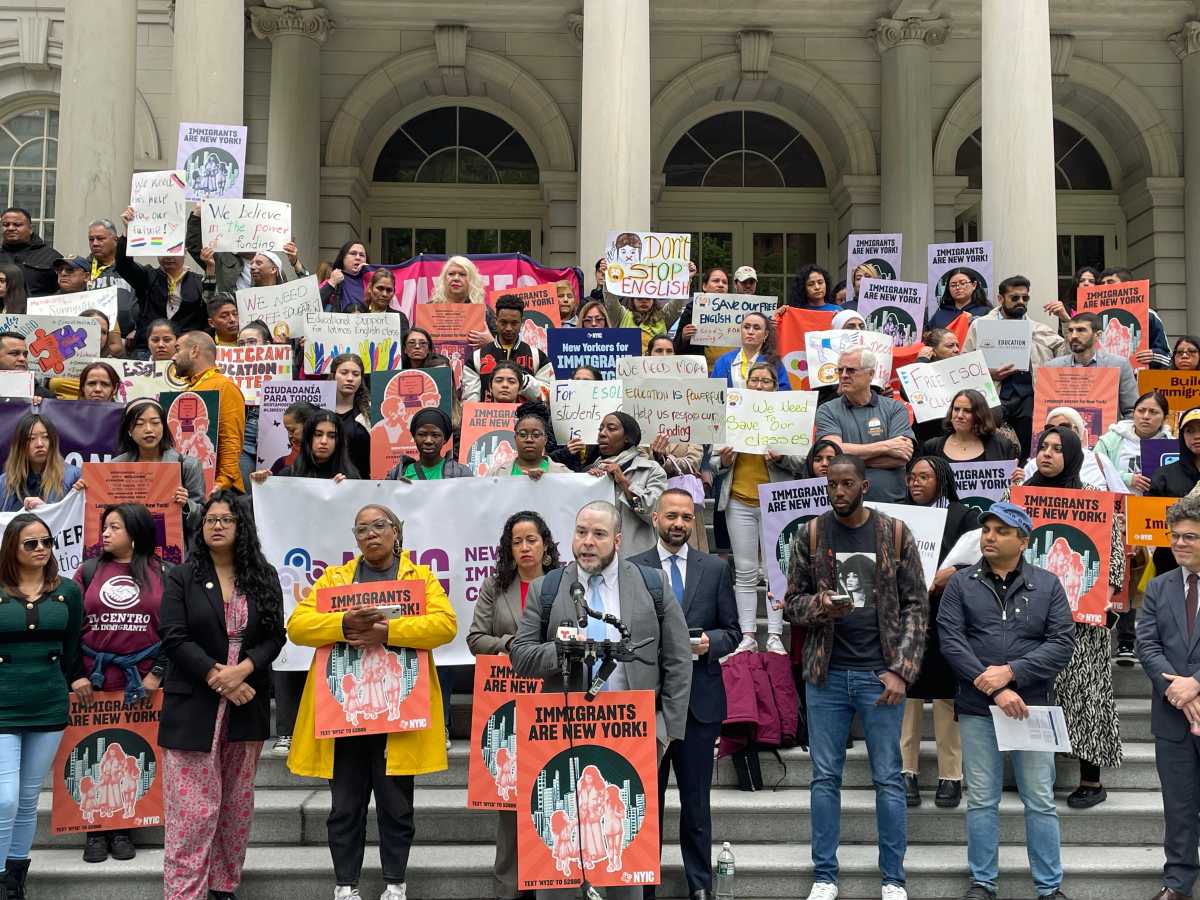 Immigrant advocates rally for pro-immigrant NYC budget and legislation.
