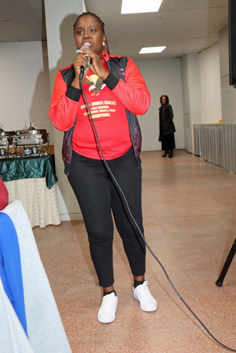 Principal Eisha Jackson addresses reception in Philadelphia.