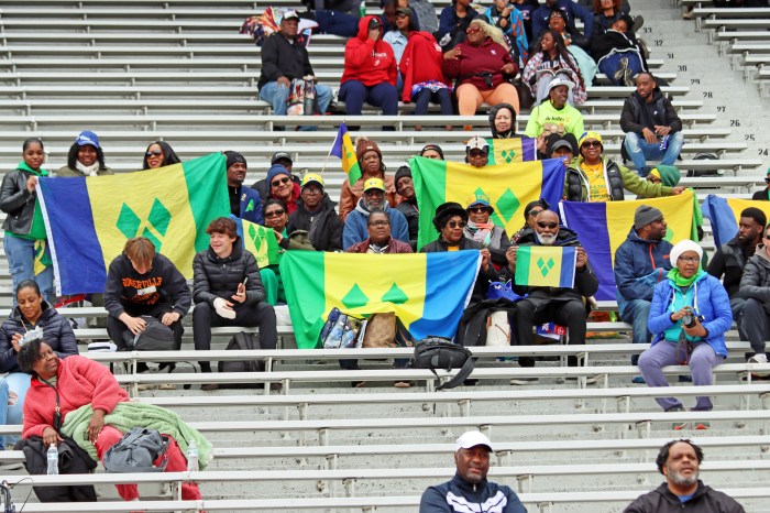 Vincentians trekked from Brooklyn to cheer on their athletes, displaying their national colors.