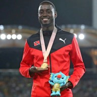 Men's 200m gold medalist Trinidad and Tobago's Jereem Richards on the podium at Carrara Stadium during the 2018 Commonwealth Games on the Gold Coast, Australia, Friday, April 13, 2018.