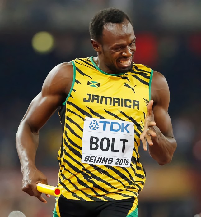 Jamaica's Usain Bolt smiles as Jamaica wins the men's 4x100m relay final at the World Athletics Championships at the Bird's Nest stadium in Beijing, Saturday, Aug. 29, 2015.