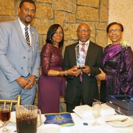 Geoffrey Holder, third from left, receives award from UVCGB President the Rev. Dr. Roxie Morris, right, flanked by Holder's wife, Gwendolyn Holder, second from left, and Consul General Rondy "Luta" McIntosh.