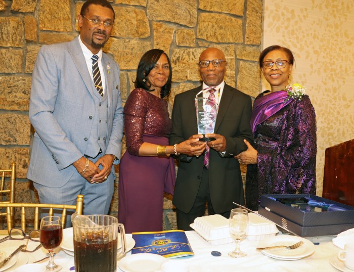Geoffrey Holder, third from left, receives award from UVCGB President the Rev. Dr. Roxie Morris, right, flanked by Holder's wife, Gwendolyn Holder, second from left, and Consul General Rondy "Luta" McIntosh.