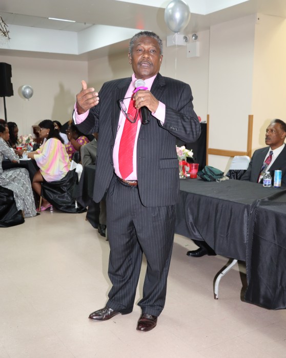 Pastor Ronald Bailey addresses patrons.