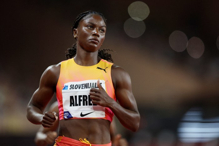 Saint Lucia's Julien Alfred reacts after winning the women's 100m at the Diamond League, Monaco, Stade Louis II, on July 12, 2024.