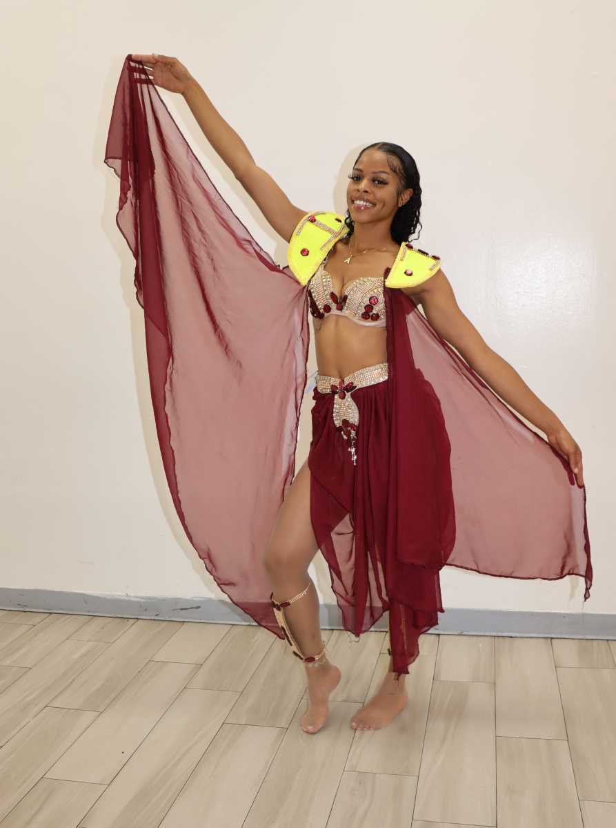 Allena Frazier portrays "Hibiscus.”