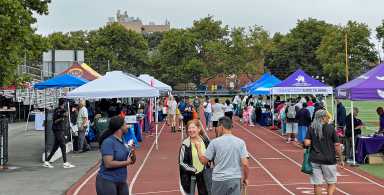 Stalls at the Back to School Health Fair and Backpack Giveaway on Saturday at the South Shore High School Field in Canarsie, Brooklyn.