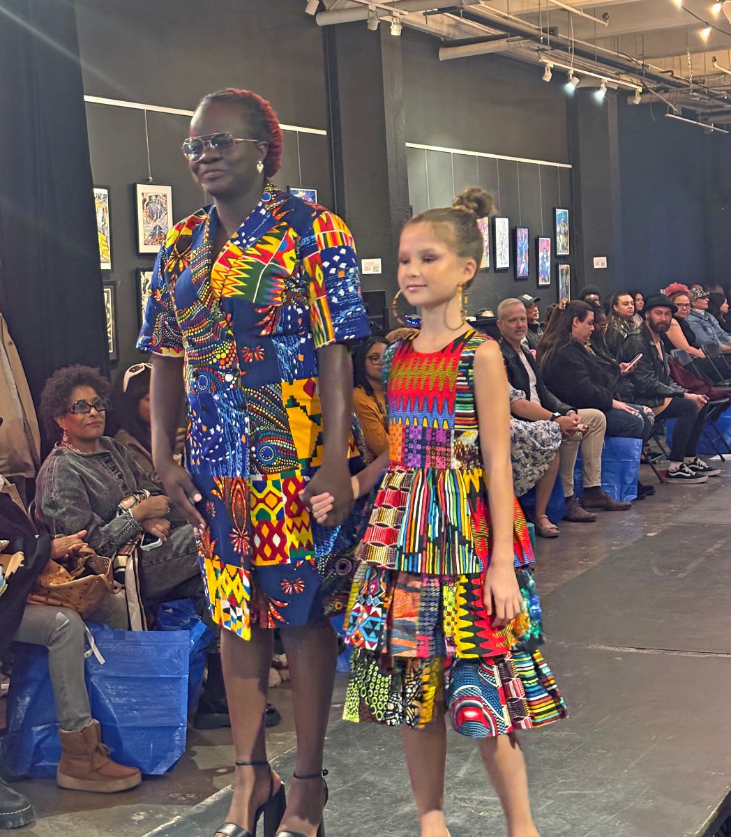 Kenyan-born, U.S.-based fashion designer Roselyne Shiyenze, owner of Shiyenze Fashion, alongside her young model Nekrasova.