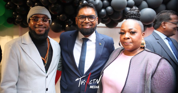President Irfaan Ali (center) with Nola's mother, Doris Rodney, and brother.