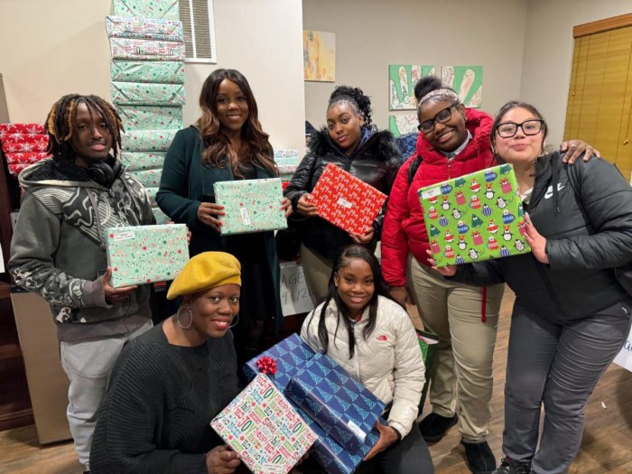 Council Member Farah N. Louis, second from left, back row, at District 45 Holiday Gift-Wrapping Party.