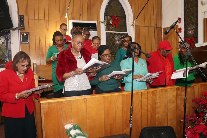 The church choir sings "Once in Royal David's City.”