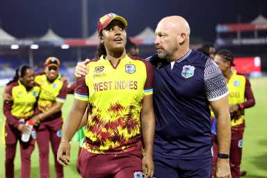 Hayley Matthews of West Indies celebrates with West Indies Head Coach Shane Deitz following the ICC Women's T20 World Cup 2024 match between Bangladesh and West Indies at Sharjah Cricket Stadium on Oct. 10, 2024 in Sharjah, United Arab Emirates.