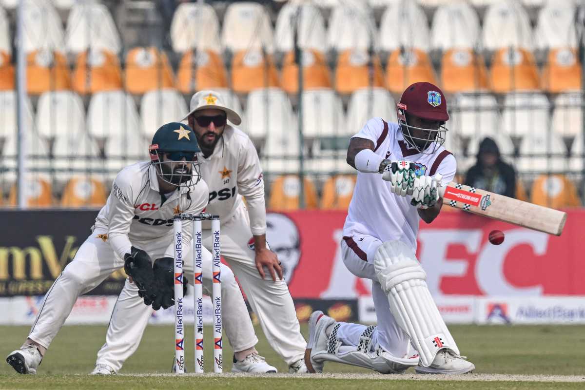 West Indies' Alick Athanaze (R) plays a shot during the third day of the first Test cricket match between Pakistan and West Indies at the Multan Cricket Stadium in Multan on Jan. 19, 2025.