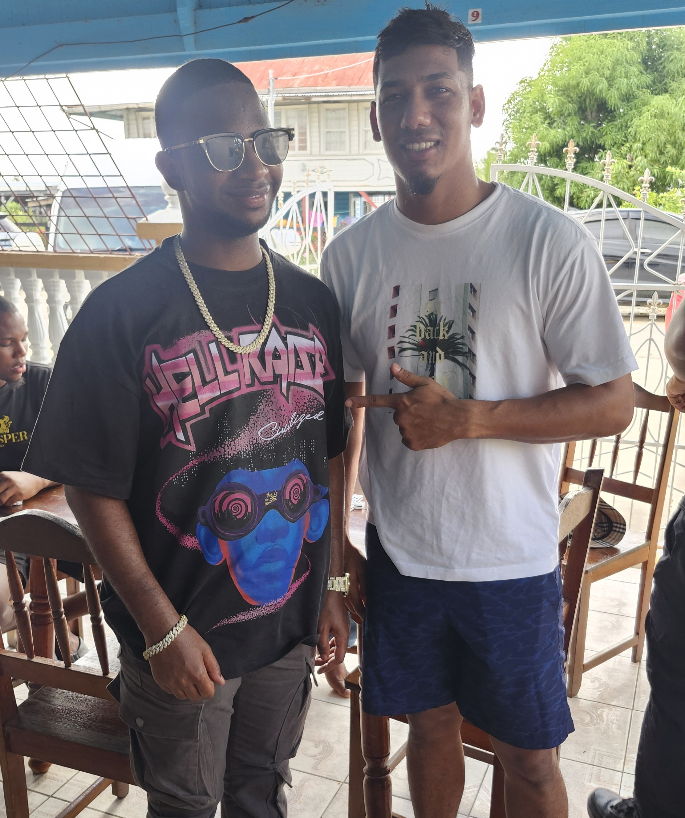 Nigy Boy and former West Indies cricketer Devendra Bishoo in Guyana