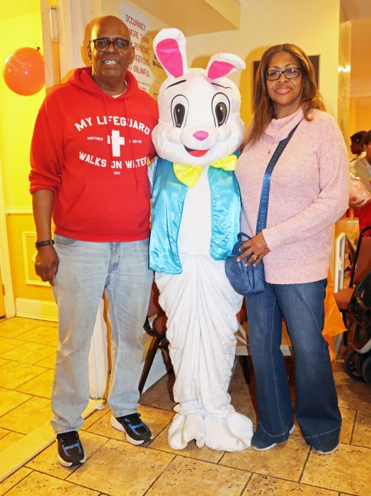 Easter Bunny, portrayed by Nataly Wilson, center, with Pastor the Rev. Roger Jackson and First Lady Kim Jackson.