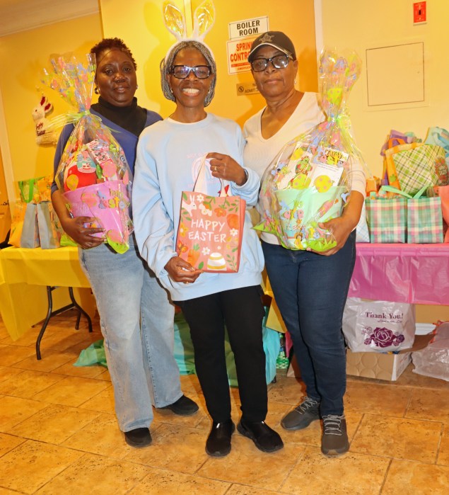 Holding Easter Baskets: Marlene Ferguson, chairperson of FSUMC Family Life Committee, center, with members Angela Als, right, and Lorna Smith.